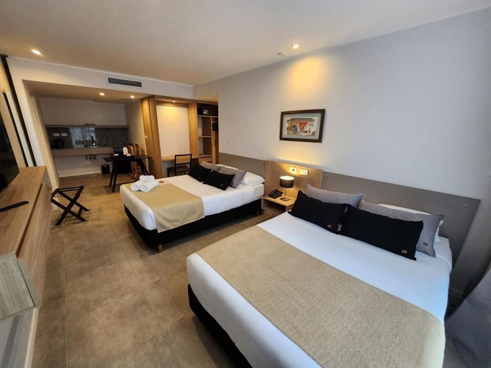 Unwind in a bright twin room with kitchenette convenience.