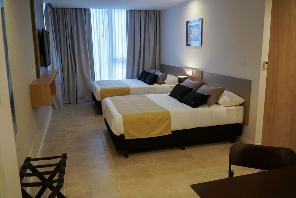 Settle into a spacious twin room flooded with daylight.