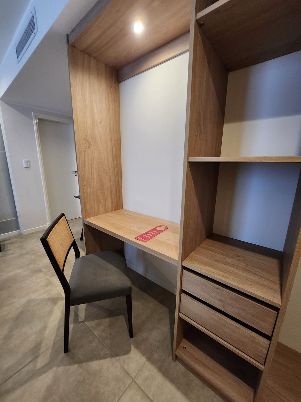 Get organized with built-in storage and a simple work nook.