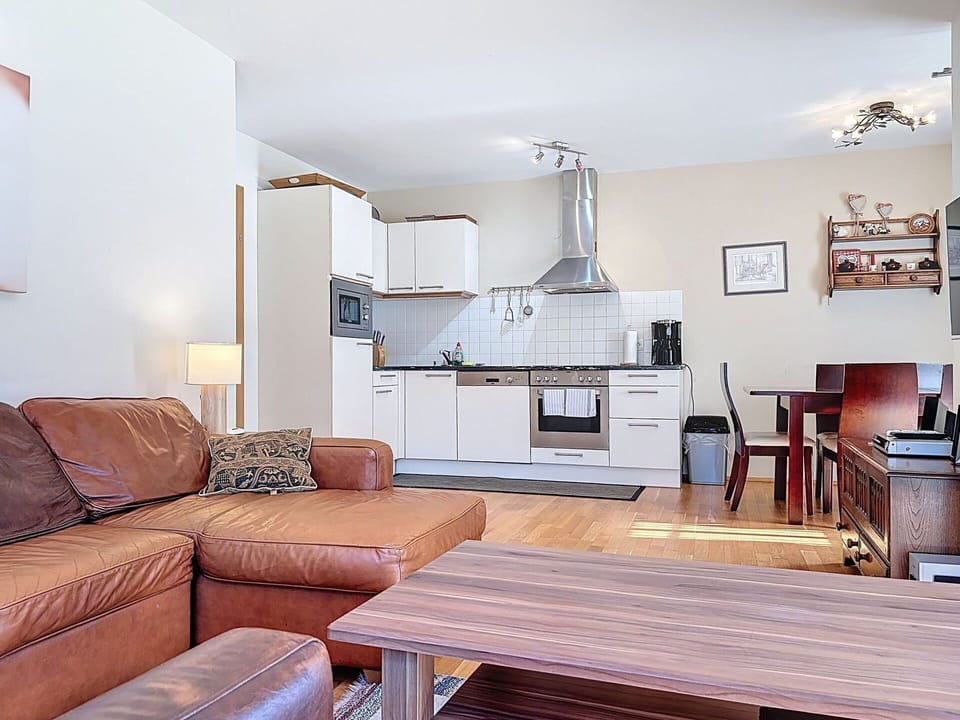 Furniture, Interior Design, Couch, Flooring, Floor, Wood, Room, Wood Flooring, Living Room, Ceiling