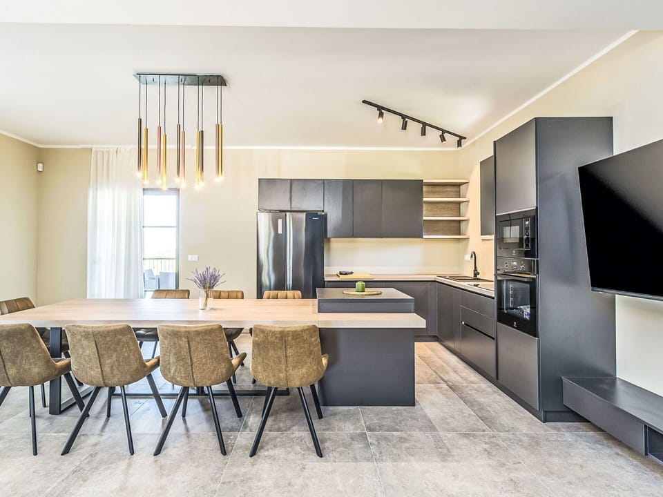 Furniture, Interior Design, Flooring, Floor, Kitchen, Countertop, Light Fixture, Chair, Wood, Ceiling