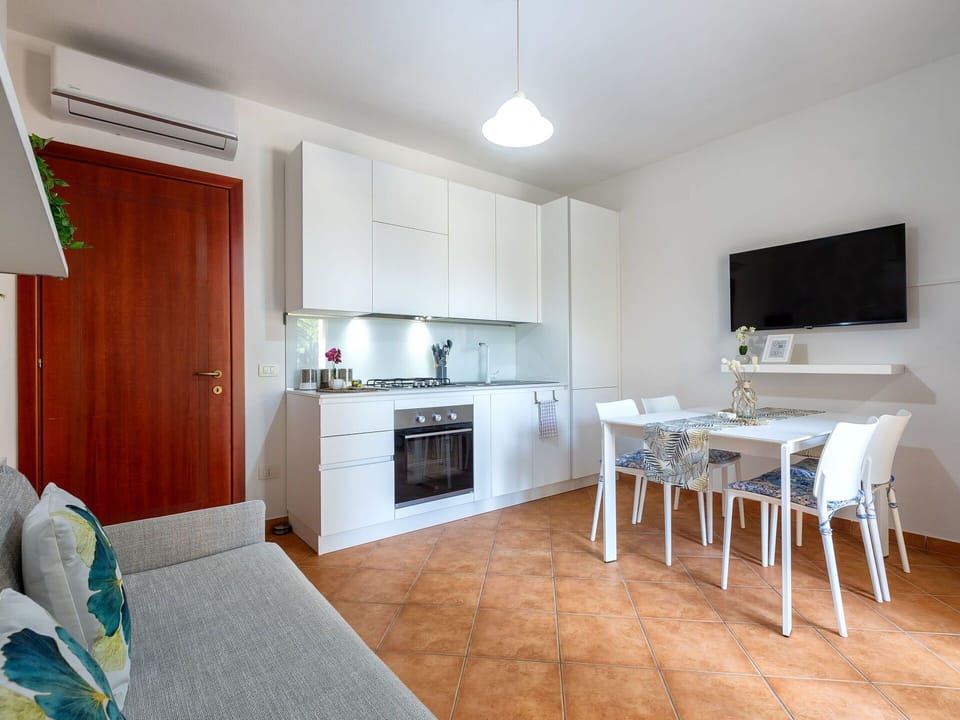 Flooring, Furniture, Interior Design, Floor, Wood, Room, Major Appliance, Kitchen Appliance, Table, Ceiling