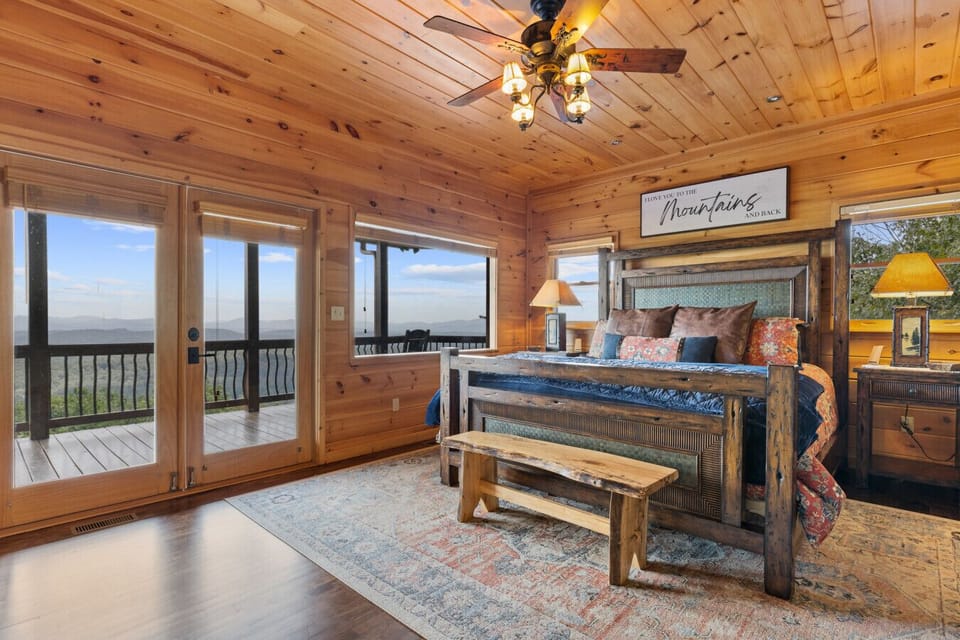 The main-level king suite opens to mountain views and fresh air