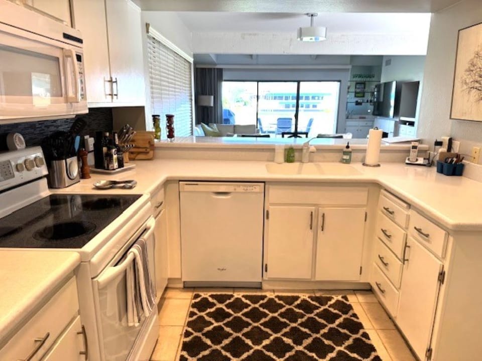 Kitchen looking out to living area.