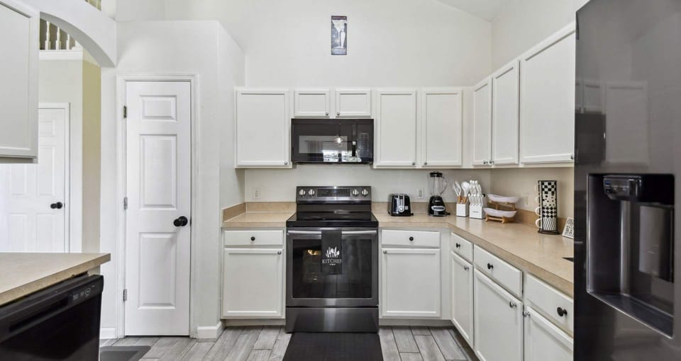 Fully equipped kitchen with modern appliances
