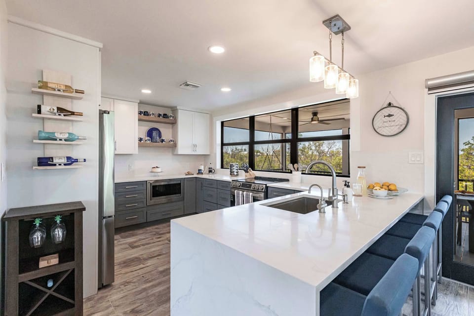 Whether you're whipping up a quick snack or a gourmet dinner, you’ll enjoy the bright, open space and the beauty of the island just beyond.
