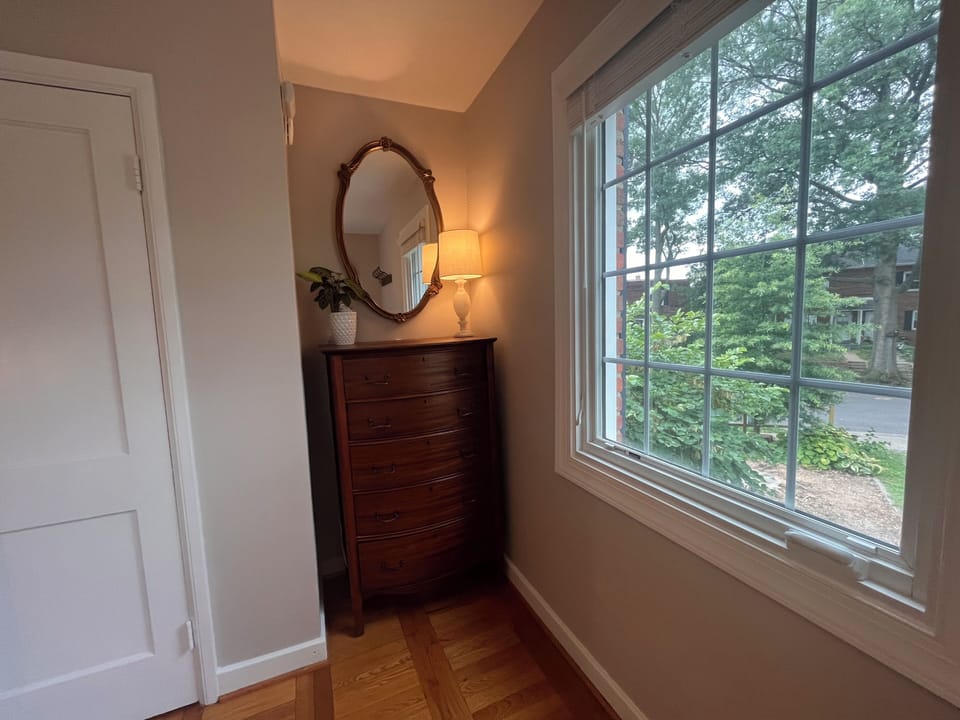 An antique highboy dresser offers lots of storage and charm.