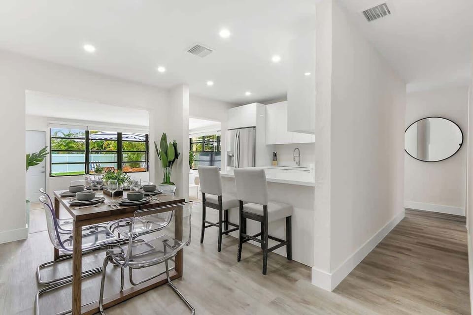 Modern kitchen and dining area.