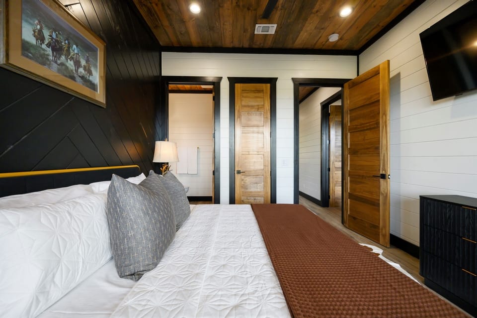 Watch, relax, and recharge—your room has it all: king bed, ensuite, and entertainment at your fingertips.