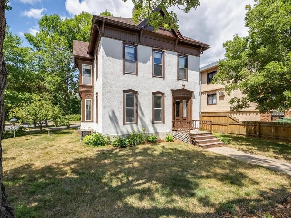 The front of the house and the entrance for this unit. 