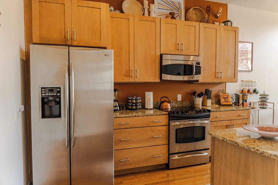 Kitchen: Discover the soul of our home in the heart of our kitchen. A sanctuary where culinary delights and laughter blend seamlessly, inviting you to linger longer, savor every aroma, and create unforgettable moments.