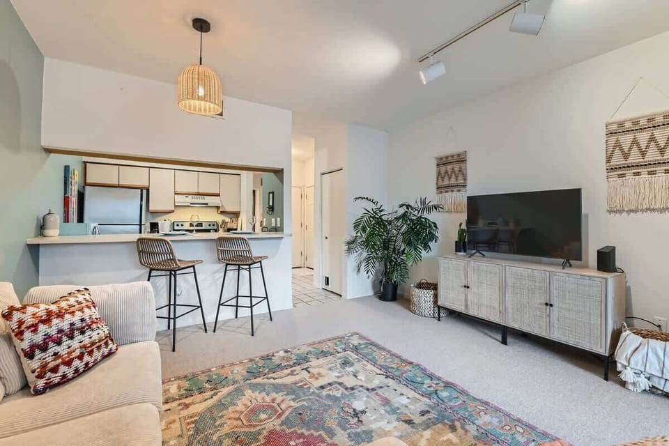 Living room with a view into the kitchen 