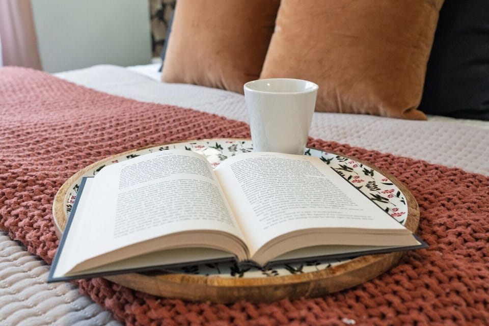 Enjoy coffee and a novel in bed 📚