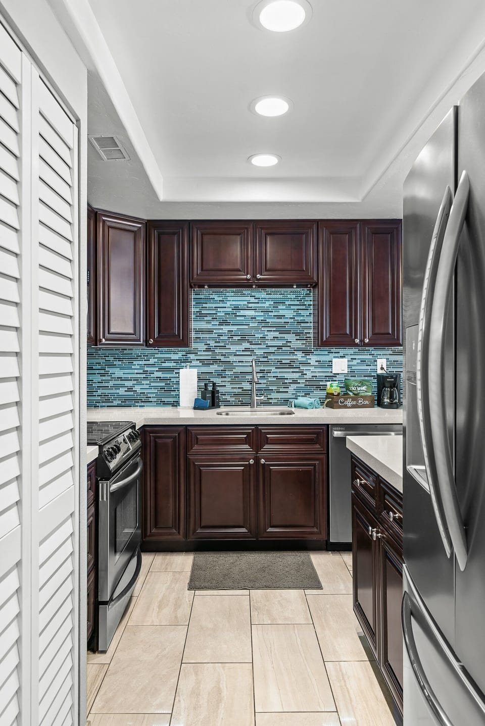 Cook with ease in the fully equipped kitchen featuring all the essentials for a comfortable stay.