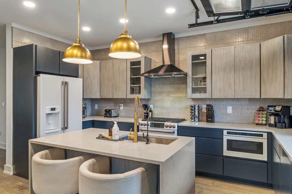 Full kitchen with all the amenities.  Unique garage-door-pass-through window.