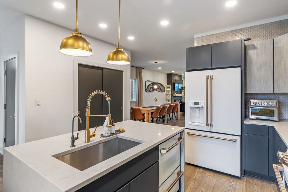 Full kitchen with all the amenities.  Unique garage-door-pass-through window.