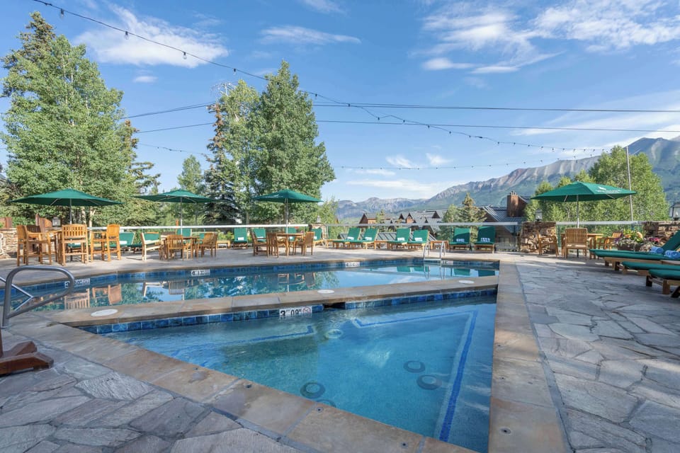 Exterior: Outdoor heated pool, 2 outdoor hot tubs 
