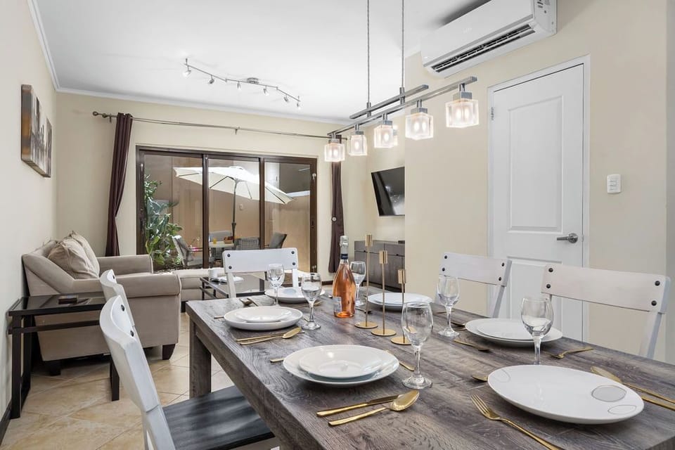 Gather around the spacious 6-seater dining area – perfect for family meals, friendly get-togethers, or memorable dinner nights during your stay.