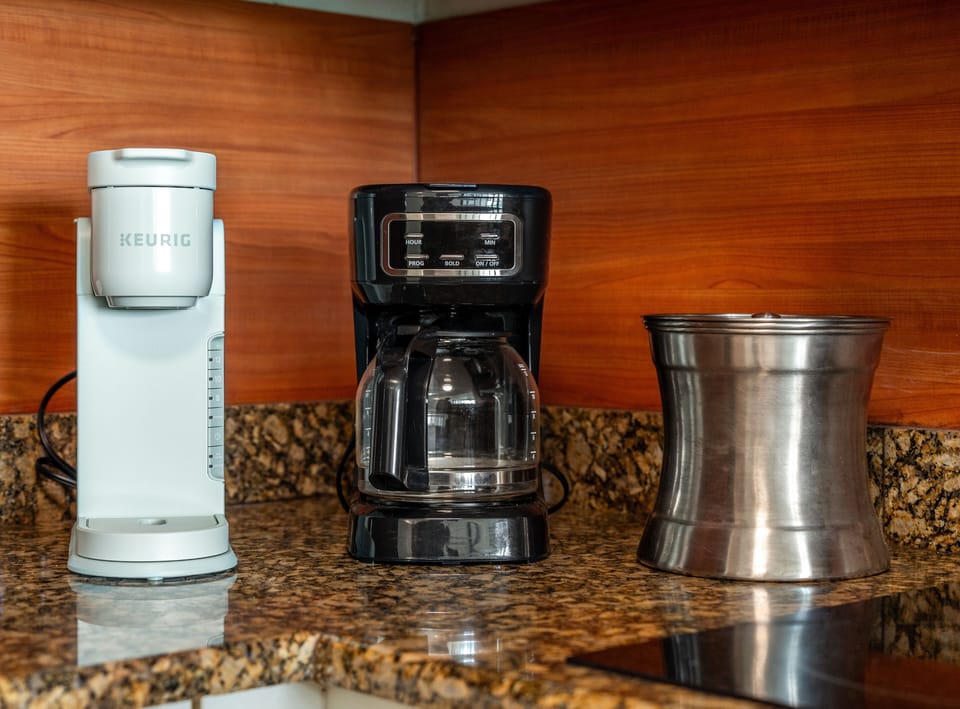 Start your day right! Choose between a fresh brewed pot or a quick Keurig cup with our versatile coffee station.