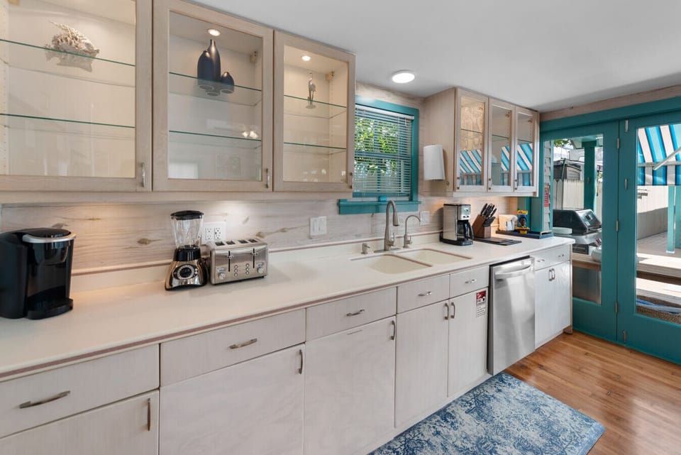 The kitchen has a Cuisinart and Keurig coffee maker.  Coffee, sugar, creamer provided for drip coffee maker.