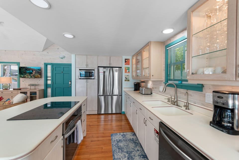The refrigerator/freezer has filtered water dispensers, ice-maker