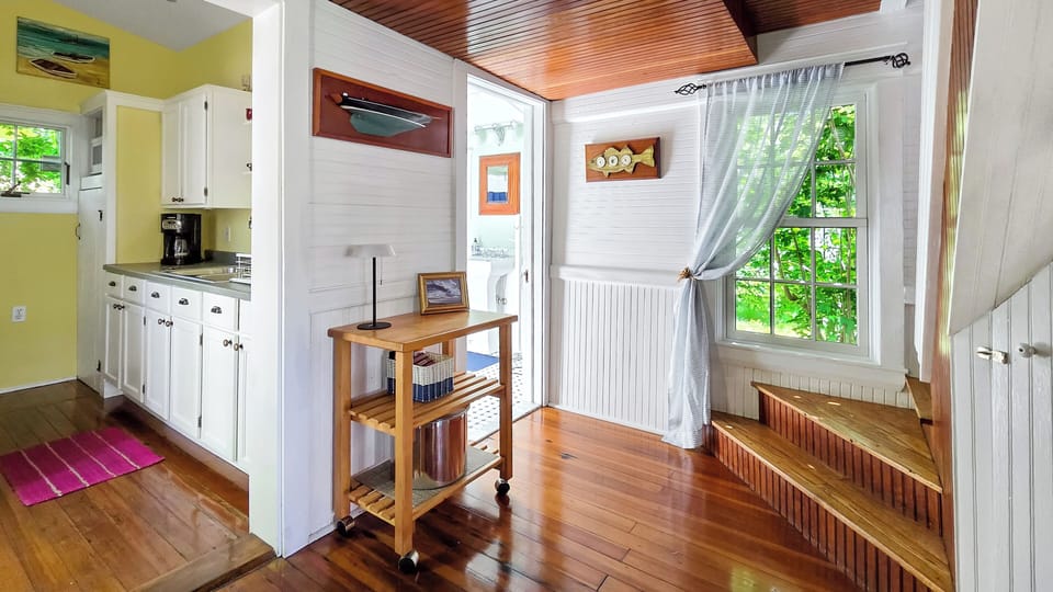 Dining area with steps to second floor