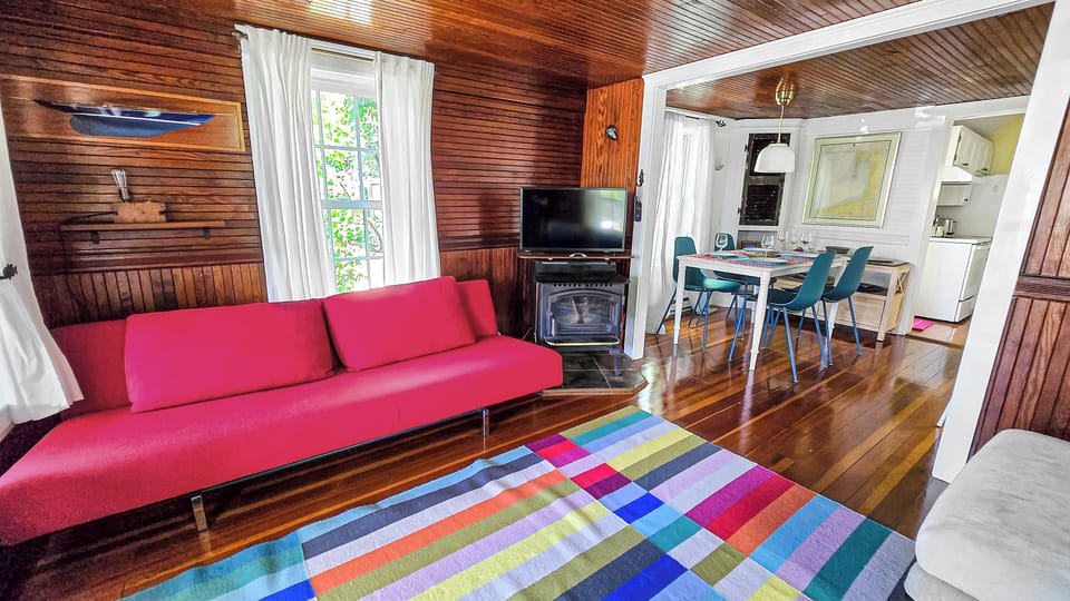 Living room with dining area beyond