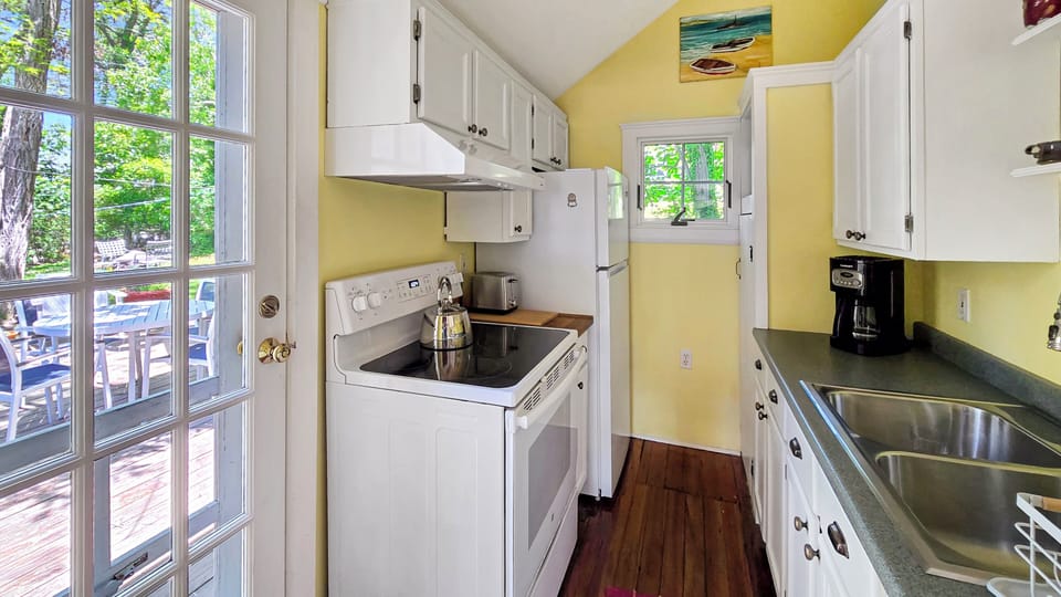 Kitchen with door to deck