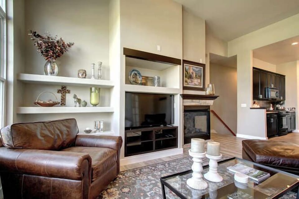 Living room with stairs leading down