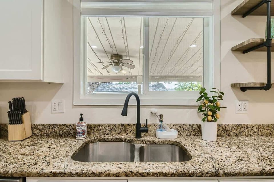 Kitchen with a view of the backyard 