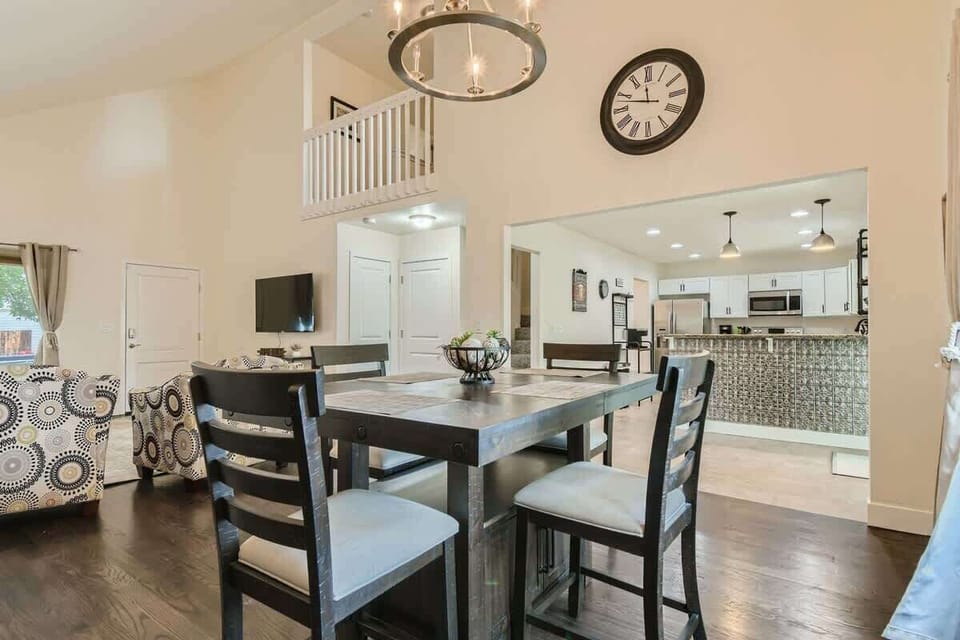 Dining table with view of the kitchen and living room 