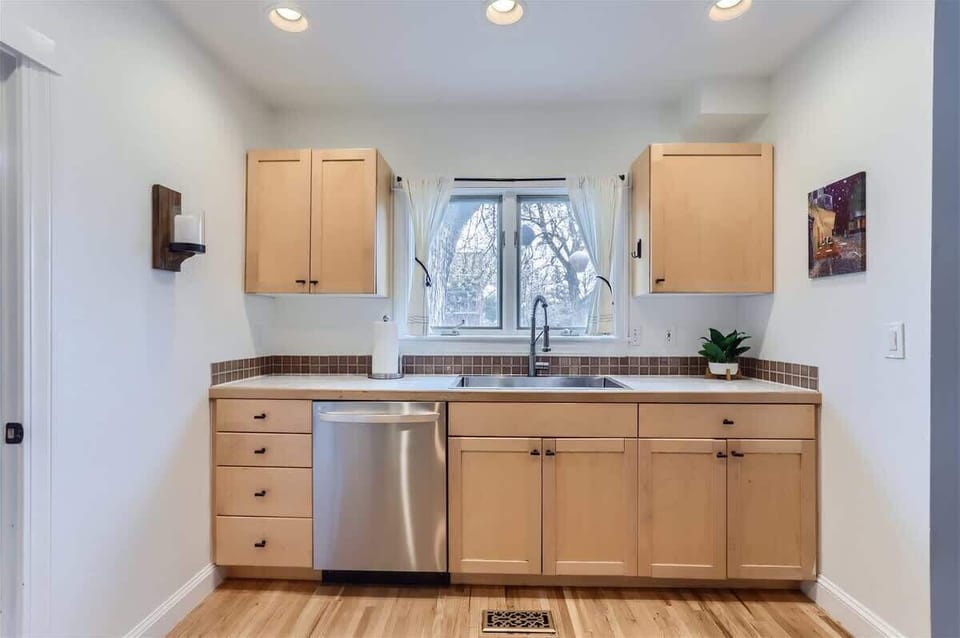 Kitchen Dishwasher with View of the Front Yard 