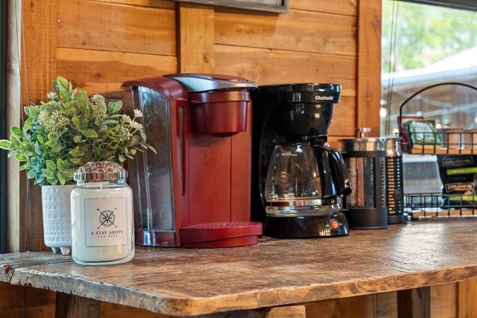 Start your day with lake views from the dedicated coffee bar—equipped with a Keurig, drip coffee maker, and all your favorite essentials. Whether you’re an early riser or a slow sipper, it’s the perfect morning retreat.