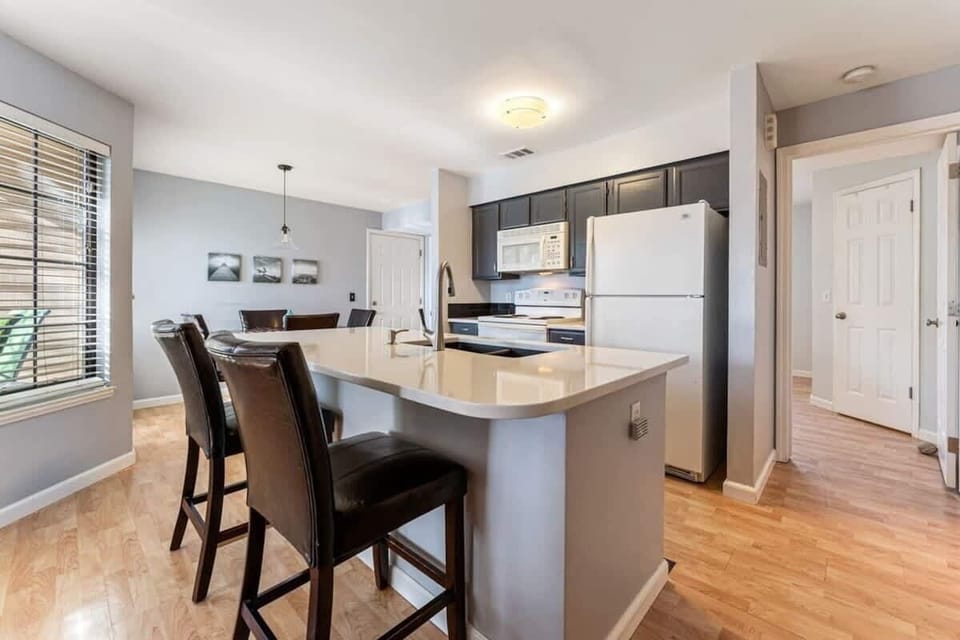Open Kitchen Featuring a Convenient Bar Counter