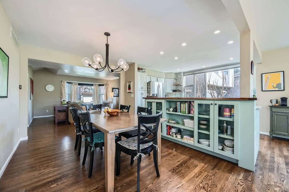 Bright dining table area adjacent to the kitchen, offering easy flow for long-term living