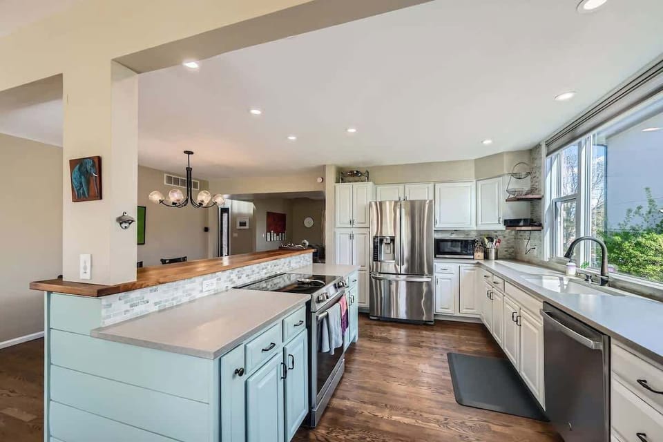 Spacious, open kitchen offering ample room for meal prep and storage