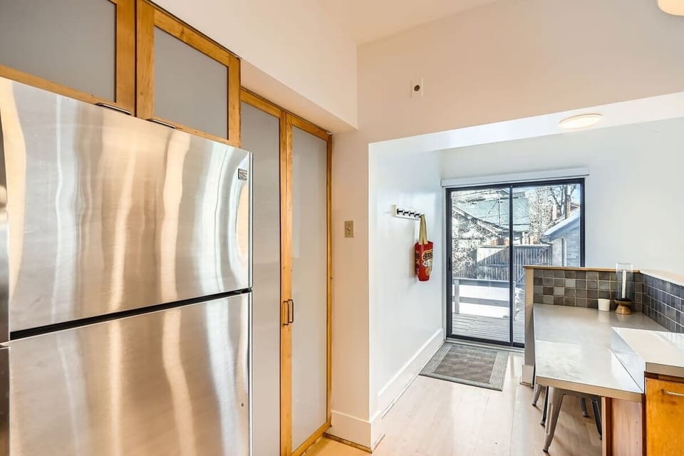 Kitchen with access to the back deck 