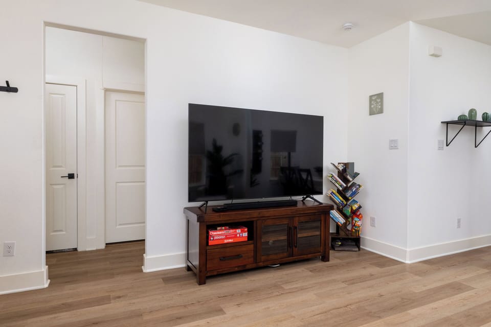 Enjoy some entertainment with the large smart tv & a variety of board games.