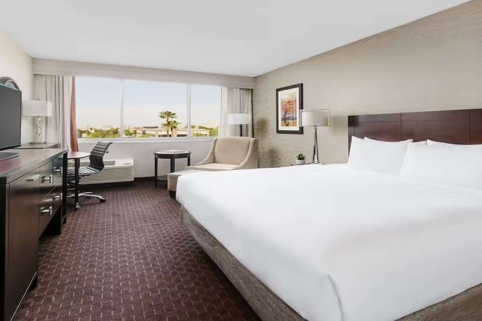Wake up to open skies and an easy in-room workspace.
