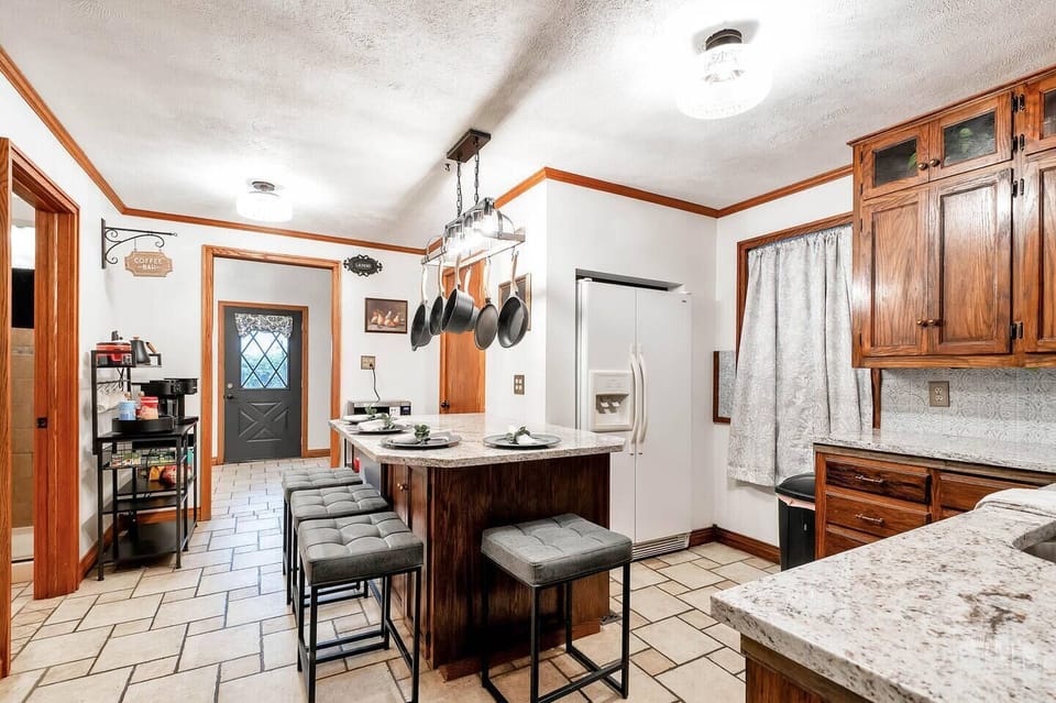 Well-stocked kitchen with bar