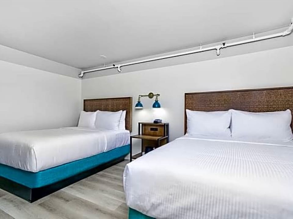Relax in a bright, airy room with clean modern lines.