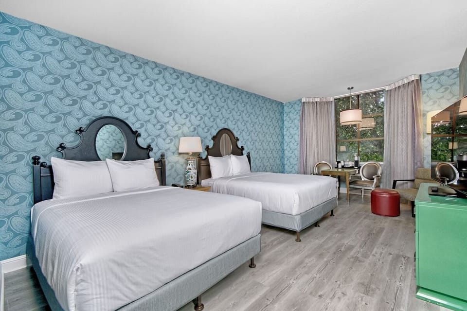 Wake up to sunshine in a stylish double-queen retreat.