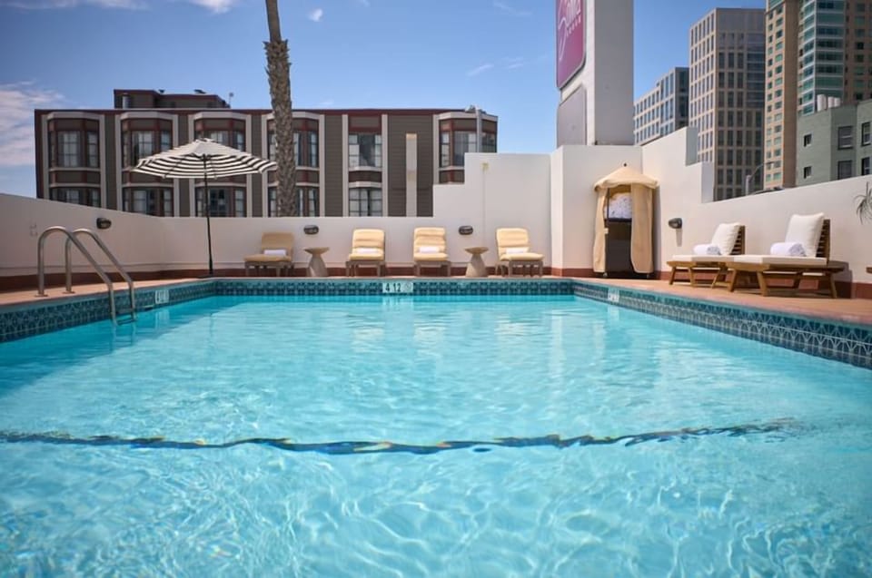 Dive into sunlit rooftop lounging with refreshing city vibes.