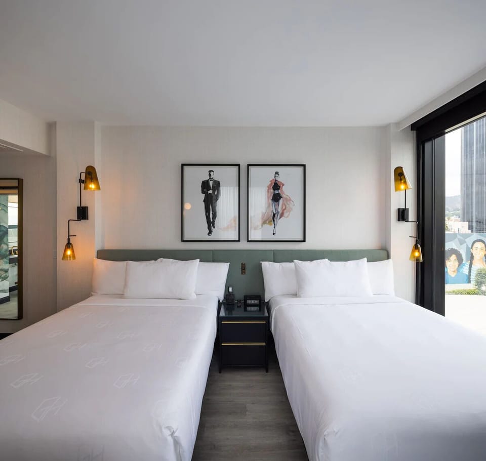 Share space comfortably with two plush beds and calming decor.