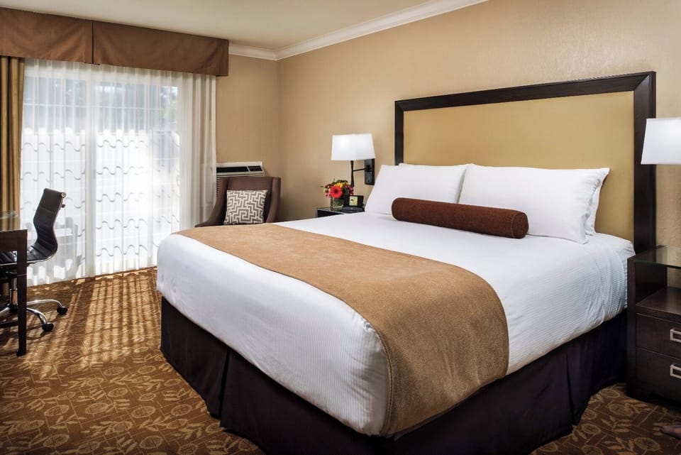 Drift off on crisp linens in a warm, quiet bedroom.