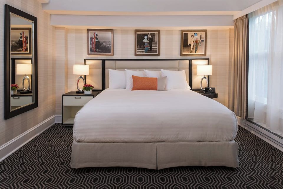 Sink into a plush king bed beneath calming designer art.