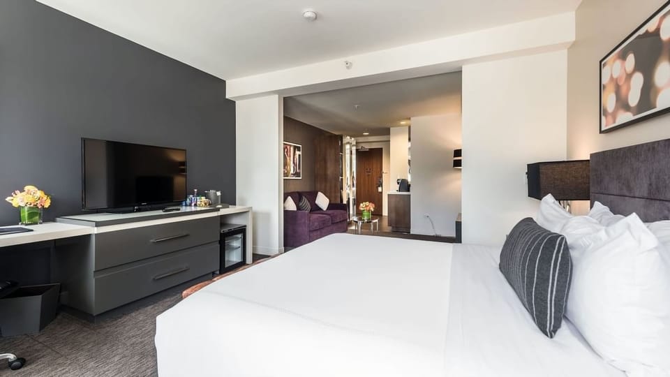 Kick back with in-room entertainment and an easy, restful setup.