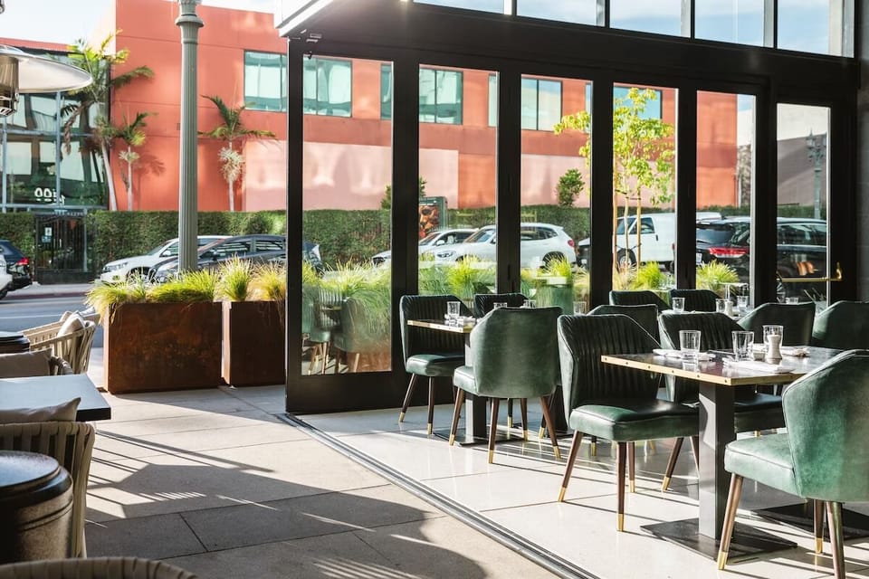 Start the night at the sleek bar with ambient lighting.