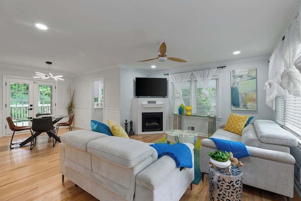 Bright and Airy Living Space: The open-concept design allows natural light to flow seamlessly through the space, enhancing the airy ambiance.