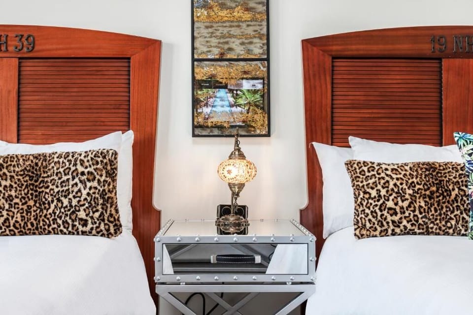 Drift off with soft textures and elegant bedside lighting.